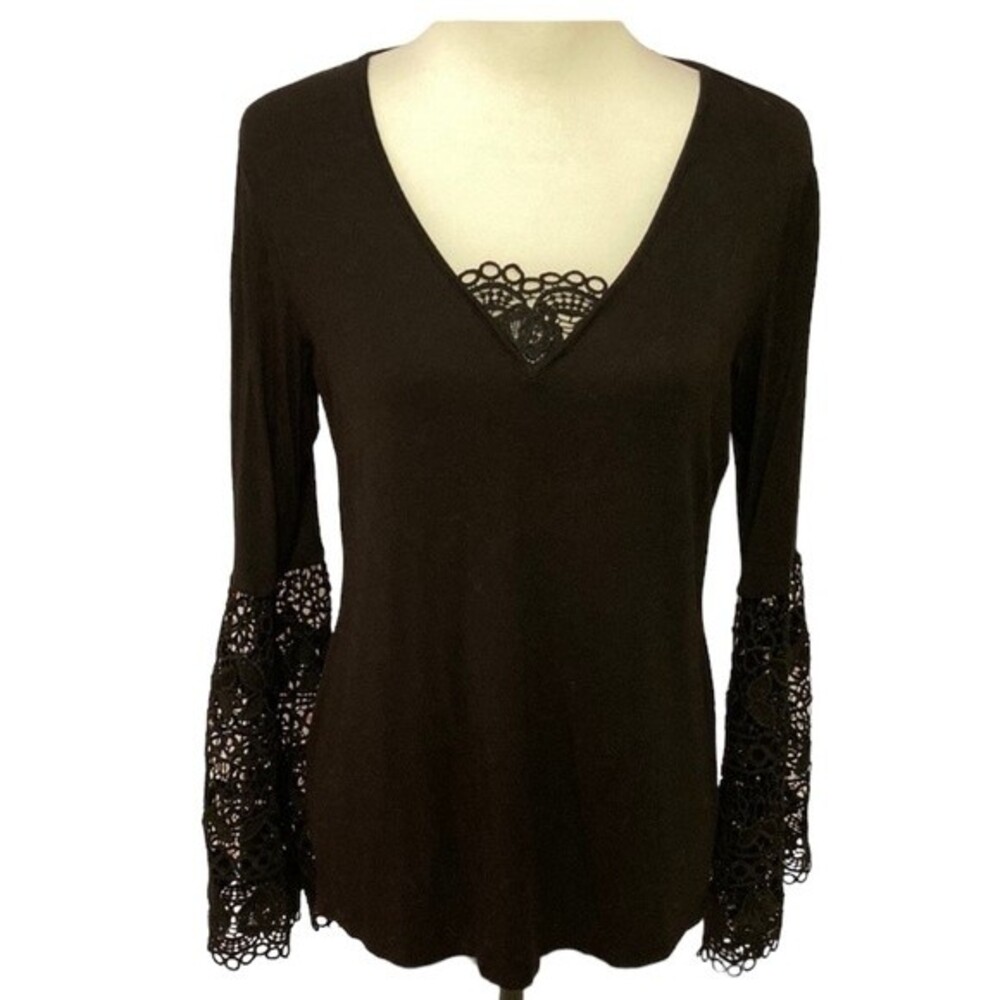 Peter Nygard black cotton/poly blouse with open weave trumpet sleeves.